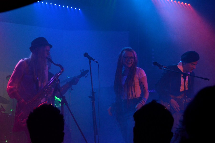 Becky playing tenor saxophone in a female-fronted Bruce Springsteen tribute gig.